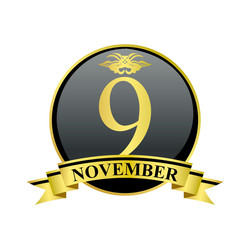 9 november golden calendar circle with ribbon