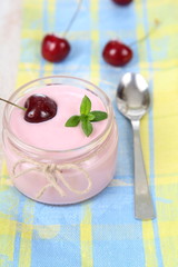 Cherry yogurt and ripe cherry