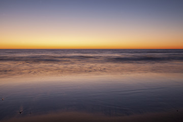 Fototapeta na wymiar Afterglow at San Elijo Etate Beach, California