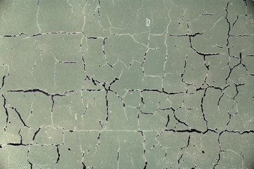 Wall fragment with attritions and cracks