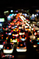 Abstract blur bokeh of traffic jam on road in the city