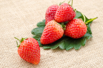 Strawberries with leaves.