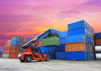 forklift handling the container box at dockyard with beautiful s