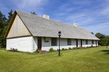 Fototapeta na wymiar Big wooden hut in museum in Tokarnia, Poland