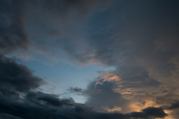 Naklejka na ściany i meble twilight sunset sky with cloudy and sunlight through clouds