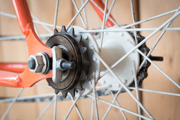 fixed gear bicycle parked with wood wall, close up image