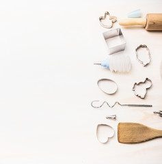 Easter bake tools setting on white wooden background, top view