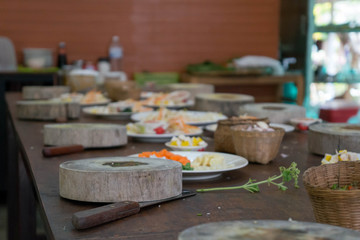 Wooden cutting block and healthy ingredients for an asian meal