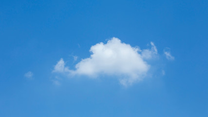 single cloud on clear blue sky with copy space for create text