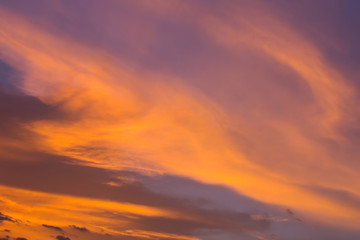 Fototapeta premium colorful dramatic sunset sky with orange cloud, twilight sky