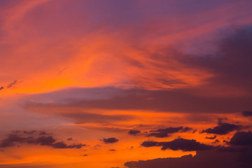 Obraz premium colorful dramatic sunset sky with orange cloud, twilight sky bac