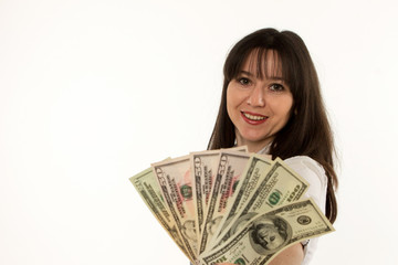 happy girl with dollars in hand on white background