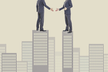 ビジネスマン同士の握手,会社の合併