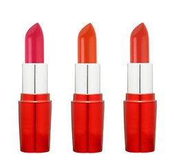 Three lipsticks isolated on white