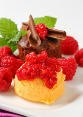 Mini chocolate cake with fresh raspberries and ice cream