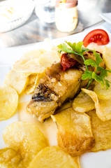 grilled salmon and lemon - french cuisine dish with tomato and s