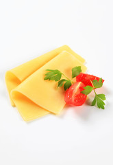 Sliced cheese and tomato wedges