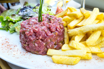 tasty Steak tartare (Raw beef) - classic steak tartare on white