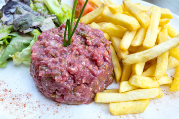 tasty Steak tartare (Raw beef) - classic steak tartare on white