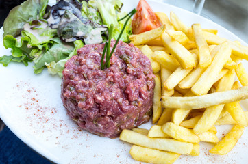 tasty Steak tartare (Raw beef) - classic steak tartare on white