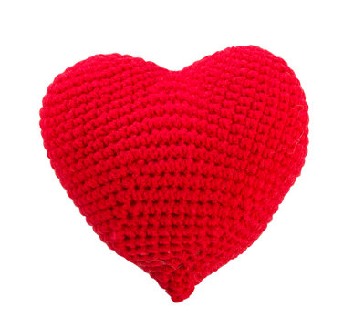 Heart made of red yarn isolated on white