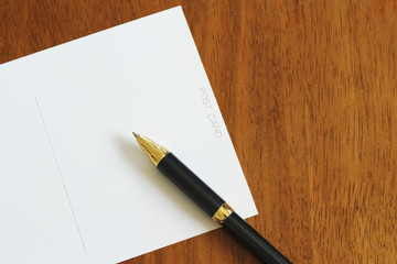 Postcard and pen