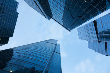 Fototapeta na wymiar Modern skyscrapers against the sky, shot from below