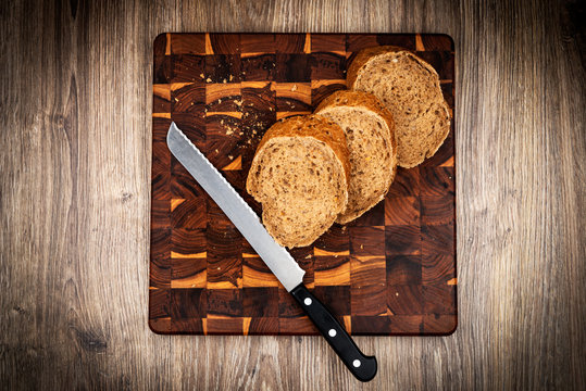 Sliced bread on wooden background