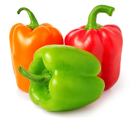 red, green and orange bell peppers on a white background