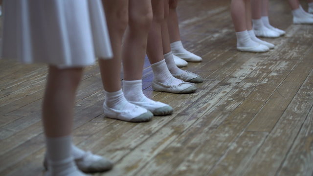 Ballet. View of little girls learn dance moves