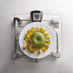 Concept healthy food on table with apple and heart message