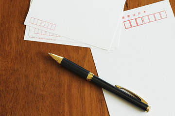 Postcard and pen