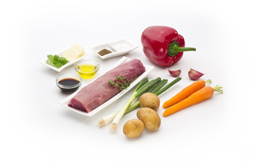 pork tenderloin,  meat with various ingredients isolated on white background