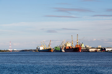 Fototapeta premium Three Freighters at Dock