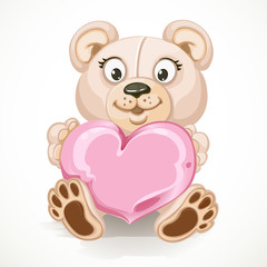 Beige teddy bear holding a heart isolated on white background