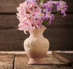 spring flowers on wooden background