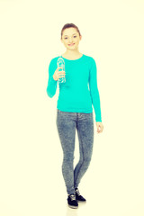 Fototapeta premium Beautiful woman with bottle of mineral water.