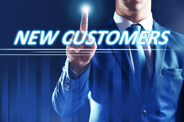 Businessman pressing new customers button on virtual screen. Internet and networking concept.