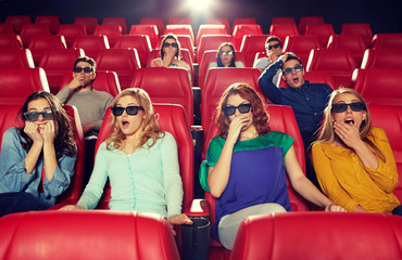 friends watching horror movie in 3d theater