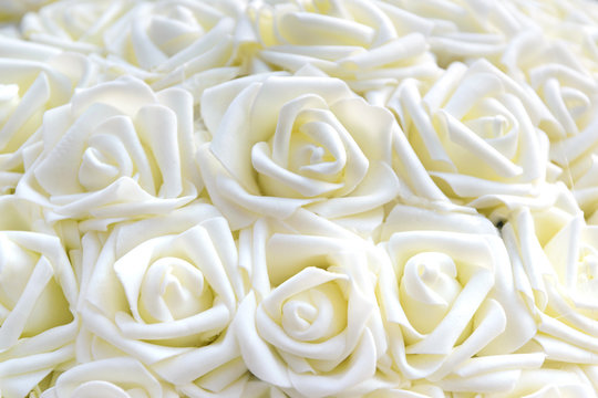 White roses made of fabric.