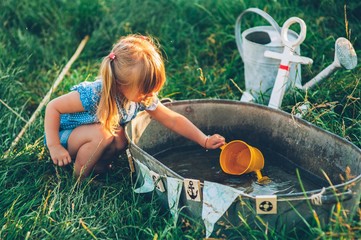little girl playing in fishing