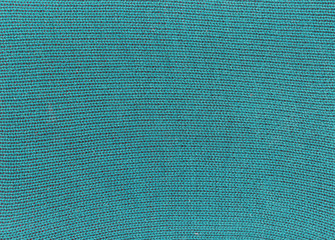Green knitted material texture.