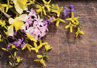 spring flowers on wooden background
