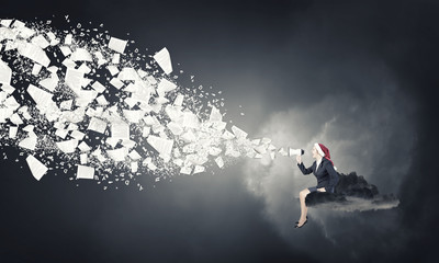 Female Santa making announcement