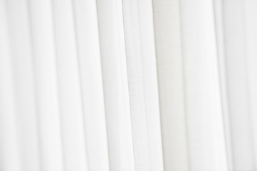 Obraz premium Sunlight through a white curtain