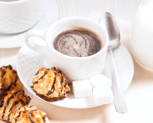 black coffee with pastries