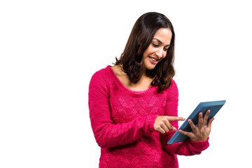 Happy woman using digital tablet