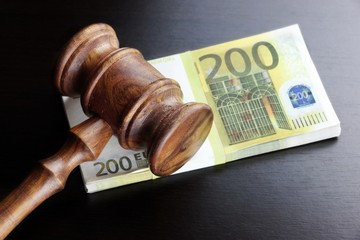 Judges Gavel And Euro Cash  On The Black Table