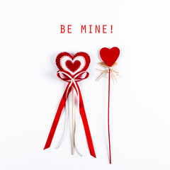 Two red valentine hearts isolated on white