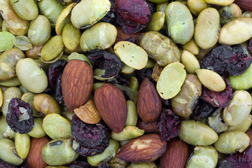 Close view of edamame with nuts and dried fruit